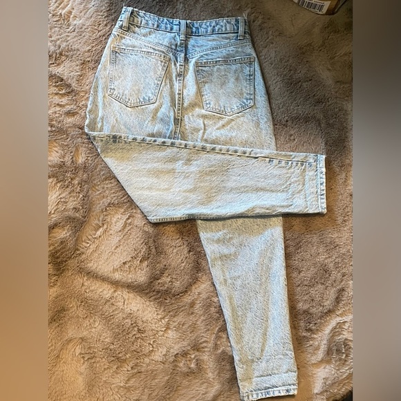 Mom  styled blue jeans distressed look at both the belt and cuffs. - Picture 3 of 3